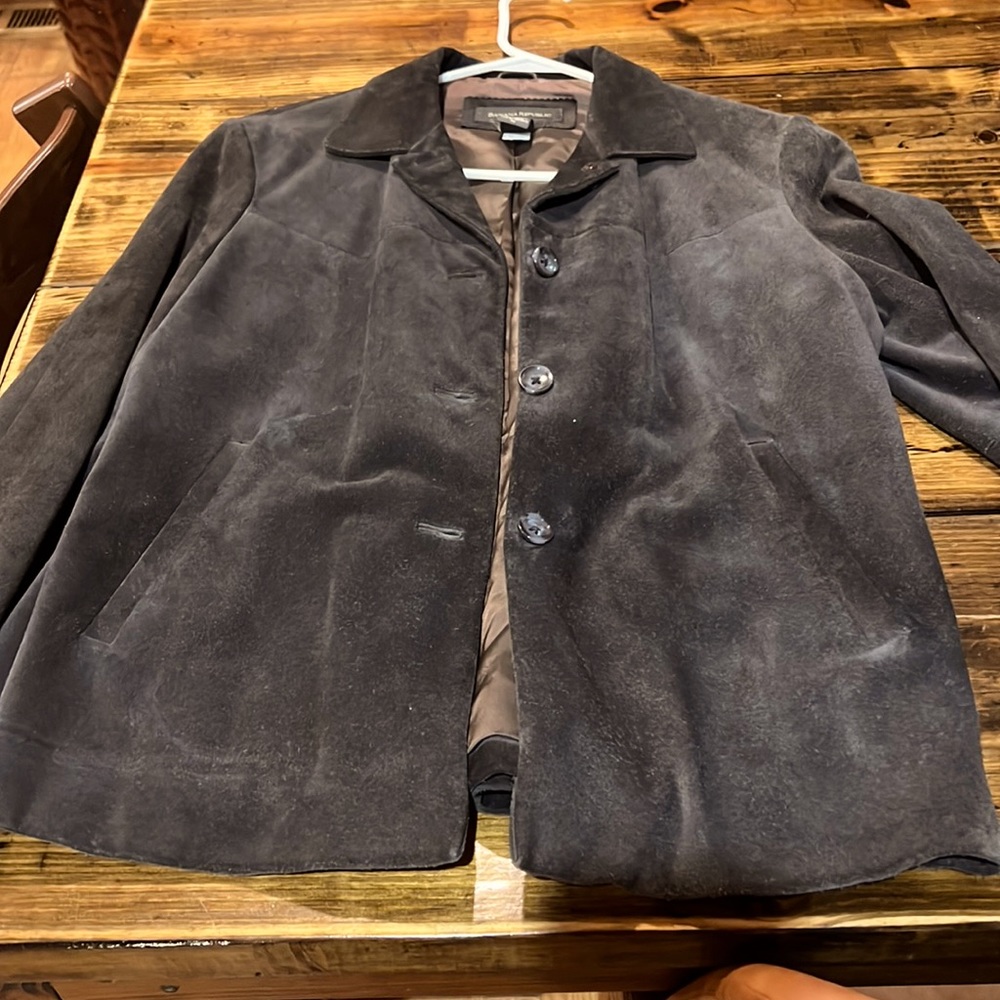 Medium leather suede jacket. It’s more of a  brown